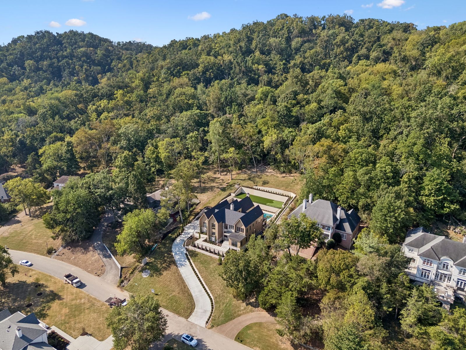 Aerial of home and wooded site